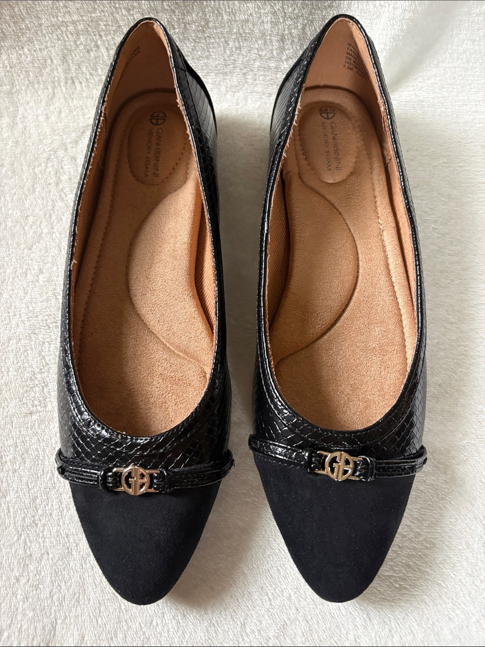 Giani Bernini Black Pointed Toe Flats with Gold Logo Accent